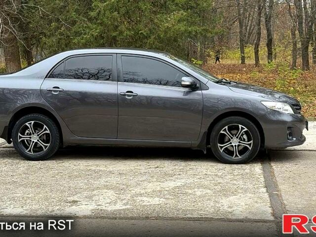 Серый Тойота Королла, объемом двигателя 1.6 л и пробегом 83 тыс. км за 10700 $, фото 3 на Automoto.ua