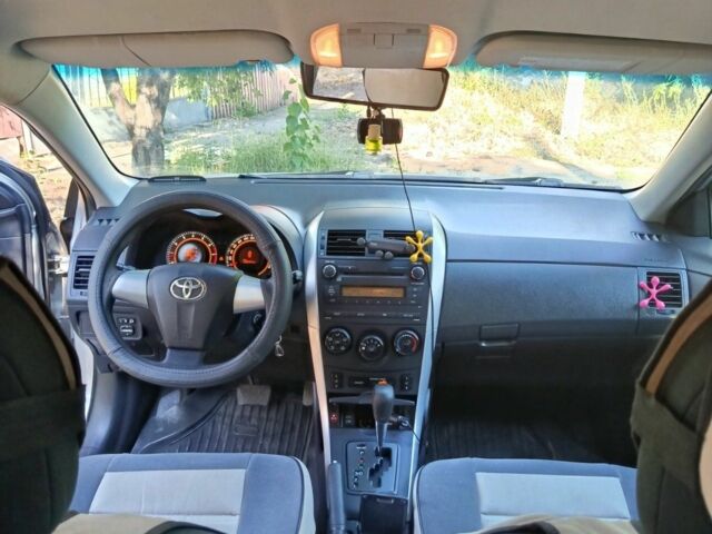 Сірий Тойота Королла, об'ємом двигуна 1.6 л та пробігом 159 тис. км за 8000 $, фото 7 на Automoto.ua