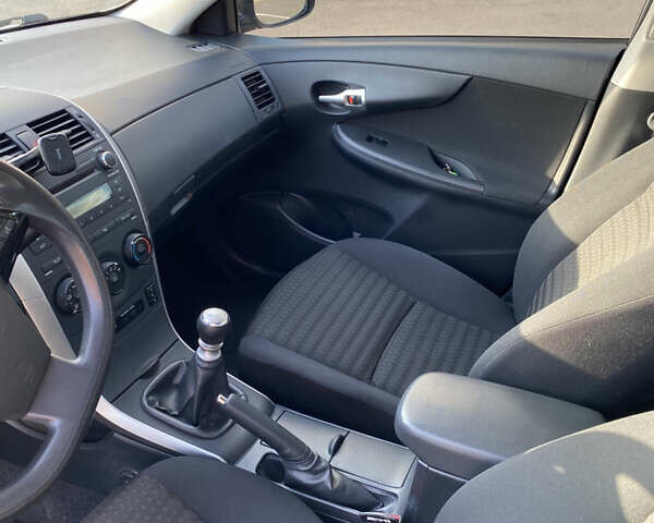 Серый Тойота Королла, объемом двигателя 1.33 л и пробегом 124 тыс. км за 8199 $, фото 10 на Automoto.ua