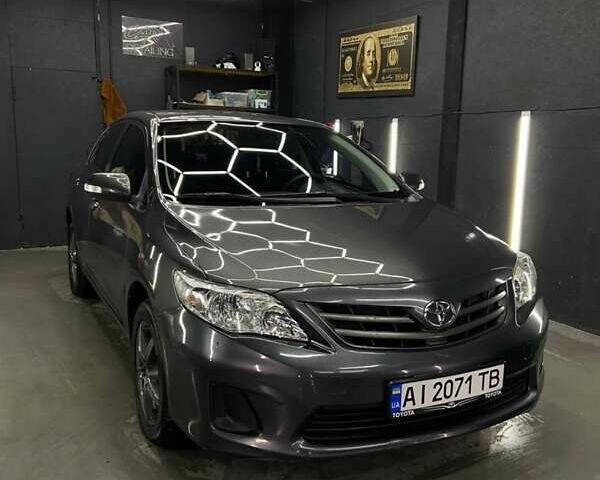 Серый Тойота Королла, объемом двигателя 1.6 л и пробегом 147 тыс. км за 7700 $, фото 1 на Automoto.ua