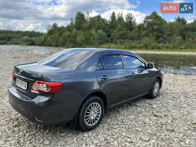 Серый Тойота Королла, объемом двигателя 1.33 л и пробегом 165 тыс. км за 7900 $, фото 7 на Automoto.ua