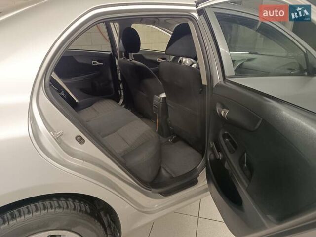 Сірий Тойота Королла, об'ємом двигуна 1.33 л та пробігом 147 тис. км за 9000 $, фото 23 на Automoto.ua