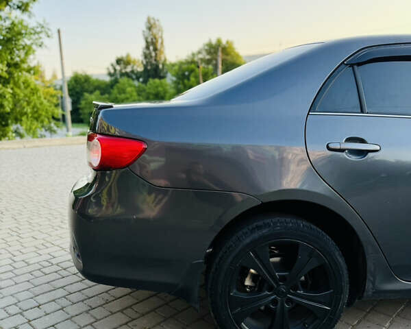 Сірий Тойота Королла, об'ємом двигуна 1.6 л та пробігом 280 тис. км за 6899 $, фото 19 на Automoto.ua