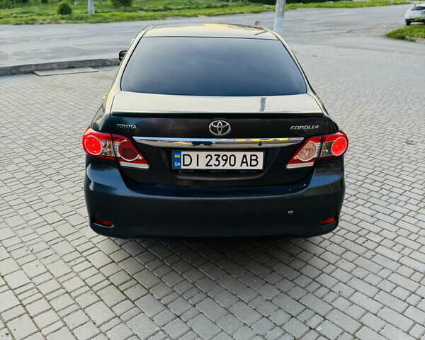 Сірий Тойота Королла, об'ємом двигуна 1.6 л та пробігом 280 тис. км за 6899 $, фото 15 на Automoto.ua