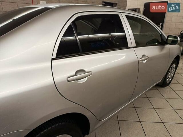 Сірий Тойота Королла, об'ємом двигуна 1.33 л та пробігом 147 тис. км за 9000 $, фото 21 на Automoto.ua