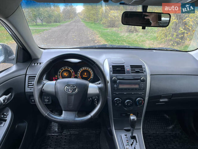 Сірий Тойота Королла, об'ємом двигуна 1.59 л та пробігом 217 тис. км за 8500 $, фото 11 на Automoto.ua