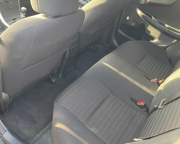 Серый Тойота Королла, объемом двигателя 1.33 л и пробегом 124 тыс. км за 8199 $, фото 15 на Automoto.ua