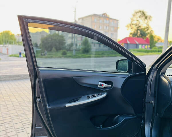 Сірий Тойота Королла, об'ємом двигуна 1.6 л та пробігом 280 тис. км за 6899 $, фото 25 на Automoto.ua