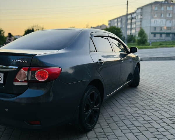 Сірий Тойота Королла, об'ємом двигуна 1.6 л та пробігом 280 тис. км за 6899 $, фото 18 на Automoto.ua