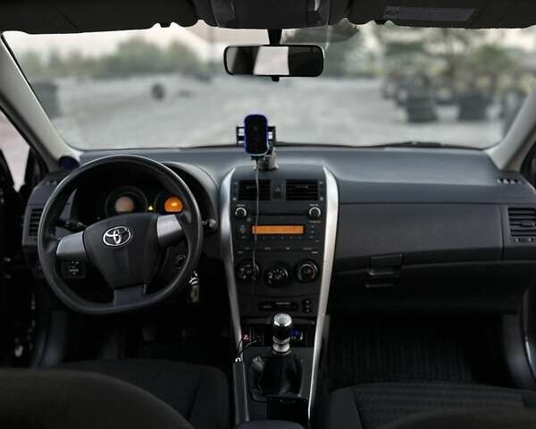 Сірий Тойота Королла, об'ємом двигуна 1.3 л та пробігом 140 тис. км за 7100 $, фото 11 на Automoto.ua