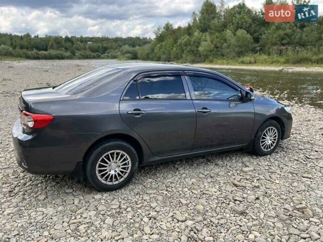 Серый Тойота Королла, объемом двигателя 1.33 л и пробегом 165 тыс. км за 7900 $, фото 1 на Automoto.ua