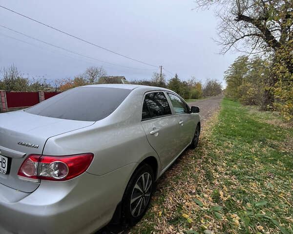 Сірий Тойота Королла, об'ємом двигуна 1.59 л та пробігом 217 тис. км за 8500 $, фото 5 на Automoto.ua