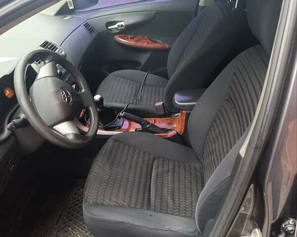 Сірий Тойота Королла, об'ємом двигуна 1.33 л та пробігом 260 тис. км за 6500 $, фото 14 на Automoto.ua