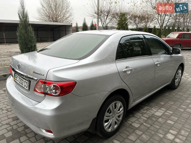 Сірий Тойота Королла, об'ємом двигуна 1.6 л та пробігом 85 тис. км за 12450 $, фото 2 на Automoto.ua