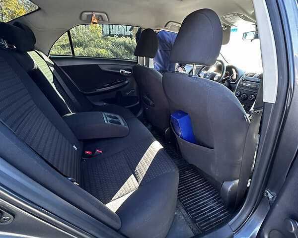 Серый Тойота Королла, объемом двигателя 1.6 л и пробегом 173 тыс. км за 8500 $, фото 11 на Automoto.ua