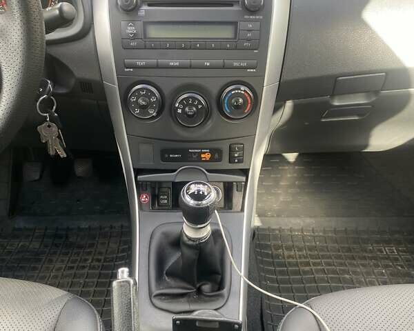 Серый Тойота Королла, объемом двигателя 1.33 л и пробегом 232 тыс. км за 7150 $, фото 11 на Automoto.ua