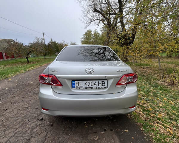 Сірий Тойота Королла, об'ємом двигуна 1.59 л та пробігом 217 тис. км за 8500 $, фото 4 на Automoto.ua