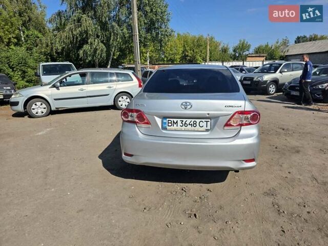 Сірий Тойота Королла, об'ємом двигуна 1.33 л та пробігом 252 тис. км за 6999 $, фото 3 на Automoto.ua