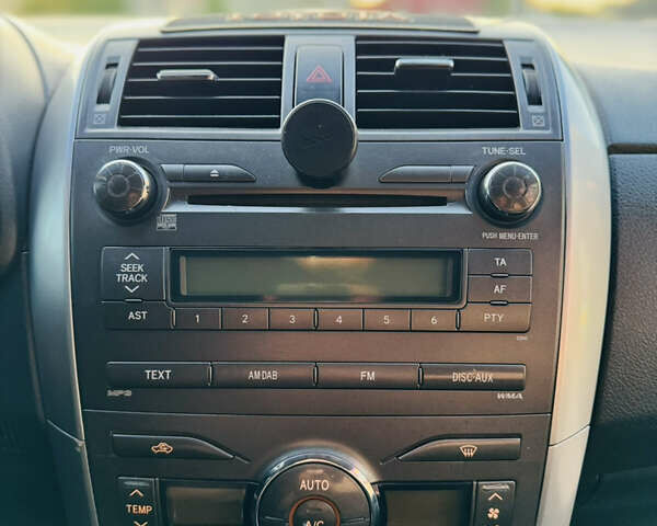 Сірий Тойота Королла, об'ємом двигуна 1.6 л та пробігом 280 тис. км за 6899 $, фото 33 на Automoto.ua