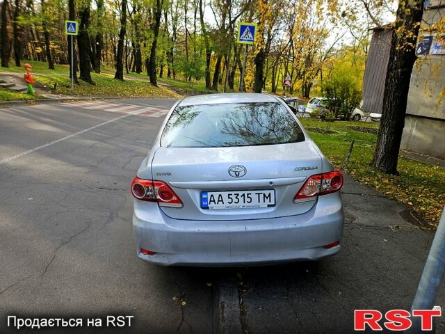 Серый Тойота Королла, объемом двигателя 1.6 л и пробегом 219 тыс. км за 6799 $, фото 2 на Automoto.ua