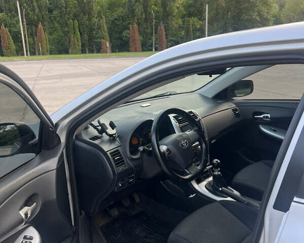 Сірий Тойота Королла, об'ємом двигуна 1.6 л та пробігом 234 тис. км за 8500 $, фото 10 на Automoto.ua