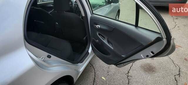 Серый Тойота Королла, объемом двигателя 1.33 л и пробегом 65 тыс. км за 9888 $, фото 8 на Automoto.ua