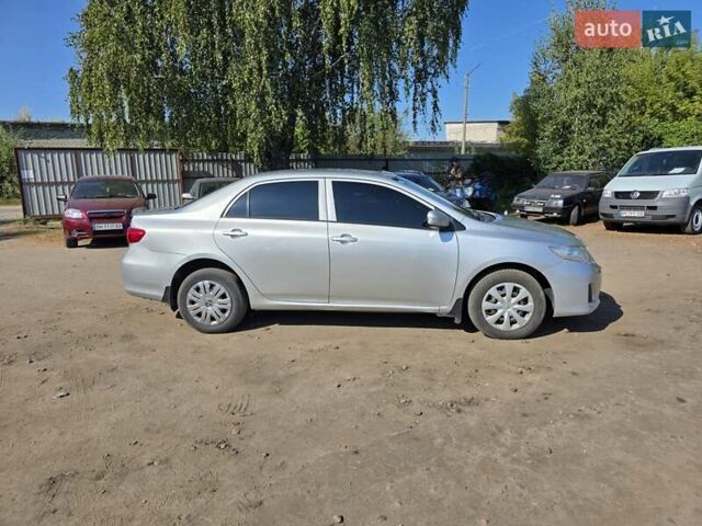 Сірий Тойота Королла, об'ємом двигуна 1.33 л та пробігом 252 тис. км за 6999 $, фото 9 на Automoto.ua