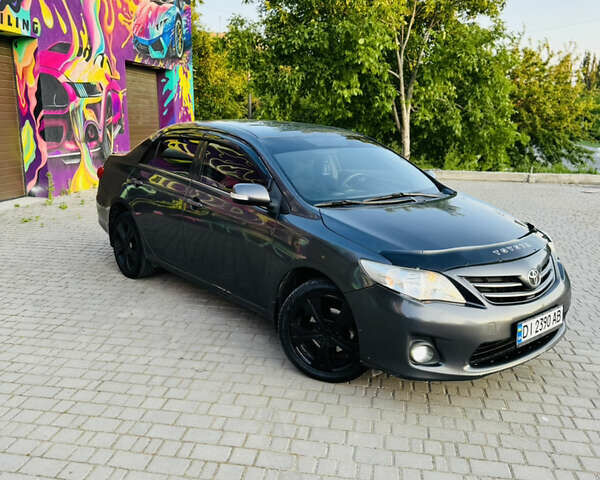 Сірий Тойота Королла, об'ємом двигуна 1.6 л та пробігом 280 тис. км за 6899 $, фото 2 на Automoto.ua