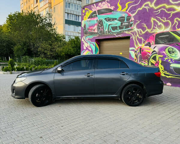 Сірий Тойота Королла, об'ємом двигуна 1.6 л та пробігом 280 тис. км за 6899 $, фото 11 на Automoto.ua