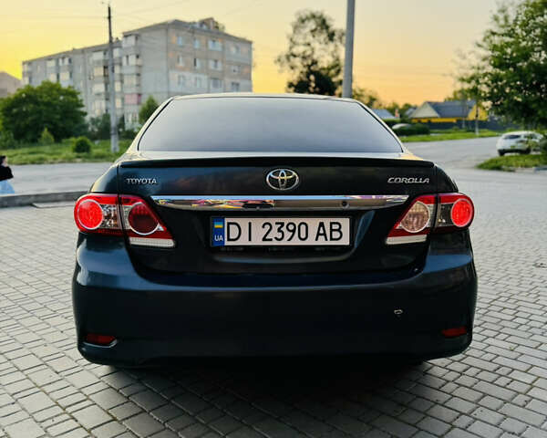 Сірий Тойота Королла, об'ємом двигуна 1.6 л та пробігом 280 тис. км за 6899 $, фото 14 на Automoto.ua