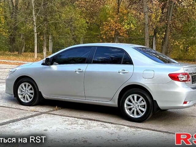 Серый Тойота Королла, объемом двигателя 1.6 л и пробегом 83 тыс. км за 10800 $, фото 2 на Automoto.ua