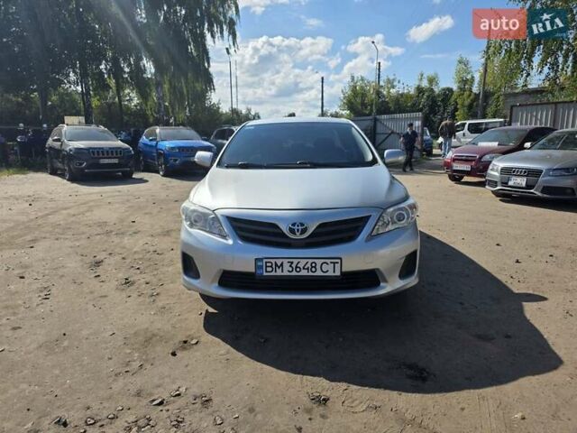 Сірий Тойота Королла, об'ємом двигуна 1.33 л та пробігом 252 тис. км за 6999 $, фото 2 на Automoto.ua