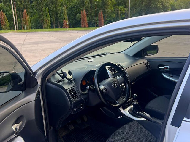 Сірий Тойота Королла, об'ємом двигуна 1.6 л та пробігом 234 тис. км за 9200 $, фото 9 на Automoto.ua