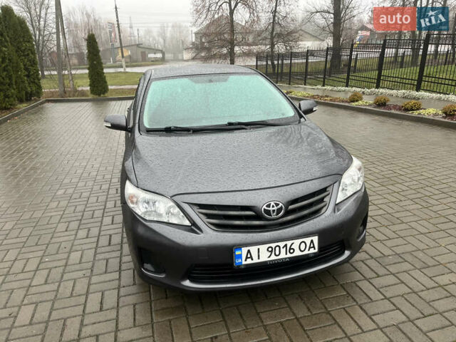Серый Тойота Королла, объемом двигателя 1.33 л и пробегом 208 тыс. км за 6300 $, фото 19 на Automoto.ua