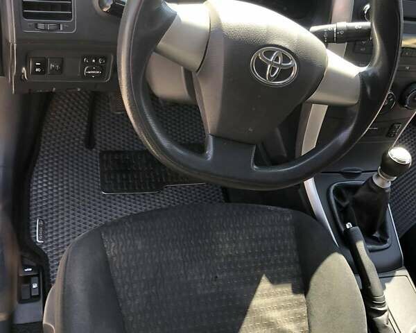 Сірий Тойота Королла, об'ємом двигуна 1.33 л та пробігом 174 тис. км за 7500 $, фото 9 на Automoto.ua