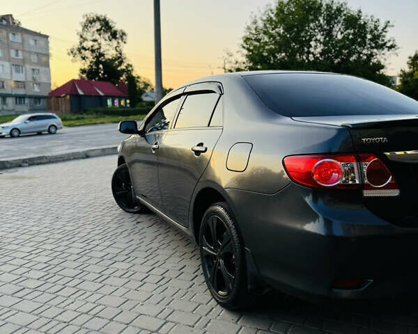 Сірий Тойота Королла, об'ємом двигуна 1.6 л та пробігом 280 тис. км за 6899 $, фото 13 на Automoto.ua