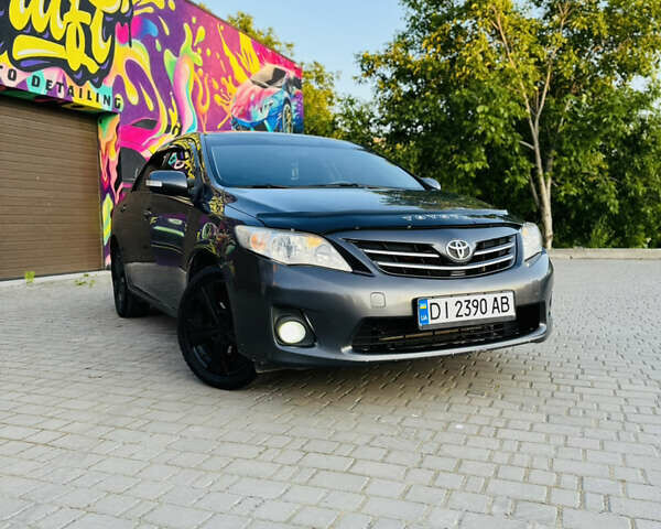 Сірий Тойота Королла, об'ємом двигуна 1.6 л та пробігом 280 тис. км за 6899 $, фото 1 на Automoto.ua