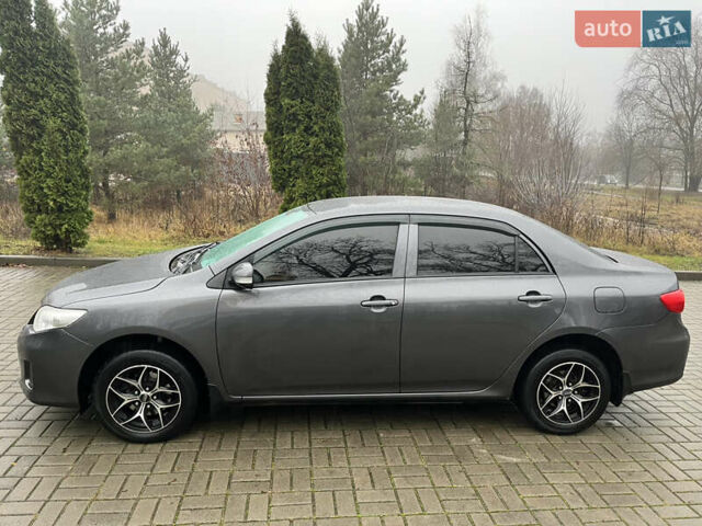 Серый Тойота Королла, объемом двигателя 1.33 л и пробегом 208 тыс. км за 6300 $, фото 1 на Automoto.ua