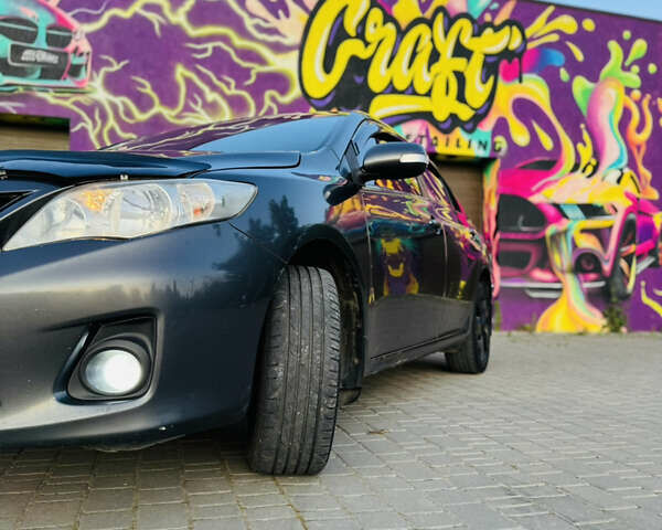 Сірий Тойота Королла, об'ємом двигуна 1.6 л та пробігом 280 тис. км за 6899 $, фото 5 на Automoto.ua