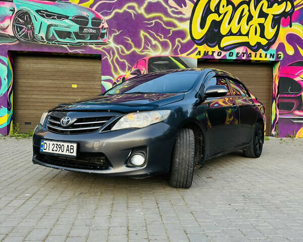 Сірий Тойота Королла, об'ємом двигуна 1.6 л та пробігом 280 тис. км за 6899 $, фото 10 на Automoto.ua