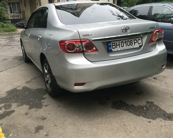 Серый Тойота Королла, объемом двигателя 1.6 л и пробегом 167 тыс. км за 10900 $, фото 2 на Automoto.ua