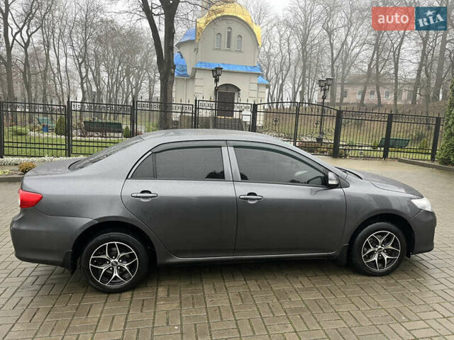 Серый Тойота Королла, объемом двигателя 1.33 л и пробегом 208 тыс. км за 6300 $, фото 5 на Automoto.ua