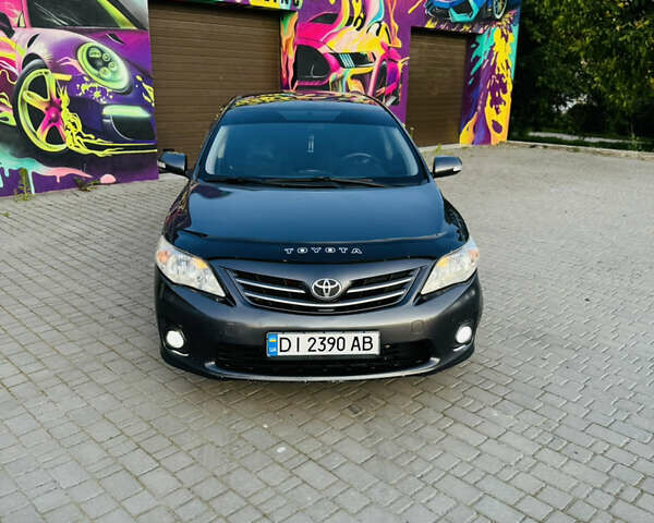 Сірий Тойота Королла, об'ємом двигуна 1.6 л та пробігом 280 тис. км за 6899 $, фото 3 на Automoto.ua