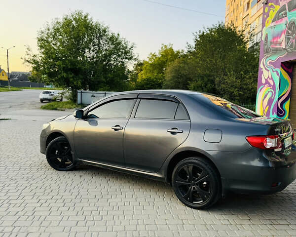 Сірий Тойота Королла, об'ємом двигуна 1.6 л та пробігом 280 тис. км за 6899 $, фото 12 на Automoto.ua