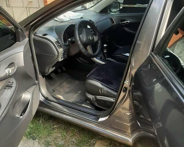 Серый Тойота Королла, объемом двигателя 1.33 л и пробегом 165 тыс. км за 7900 $, фото 13 на Automoto.ua