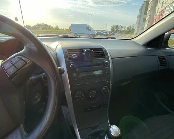 Серый Тойота Королла, объемом двигателя 1.33 л и пробегом 124 тыс. км за 8199 $, фото 12 на Automoto.ua