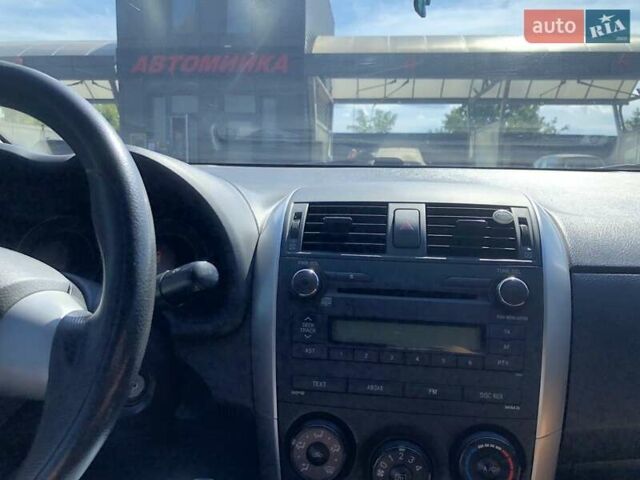 Сірий Тойота Королла, об'ємом двигуна 1.33 л та пробігом 174 тис. км за 7500 $, фото 7 на Automoto.ua