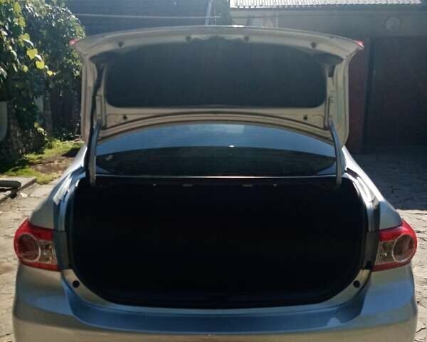 Сірий Тойота Королла, об'ємом двигуна 1.33 л та пробігом 220 тис. км за 7300 $, фото 1 на Automoto.ua