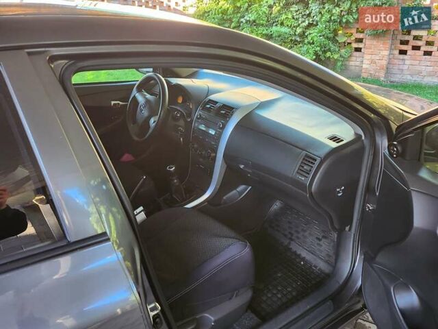 Серый Тойота Королла, объемом двигателя 1.33 л и пробегом 177 тыс. км за 7500 $, фото 2 на Automoto.ua