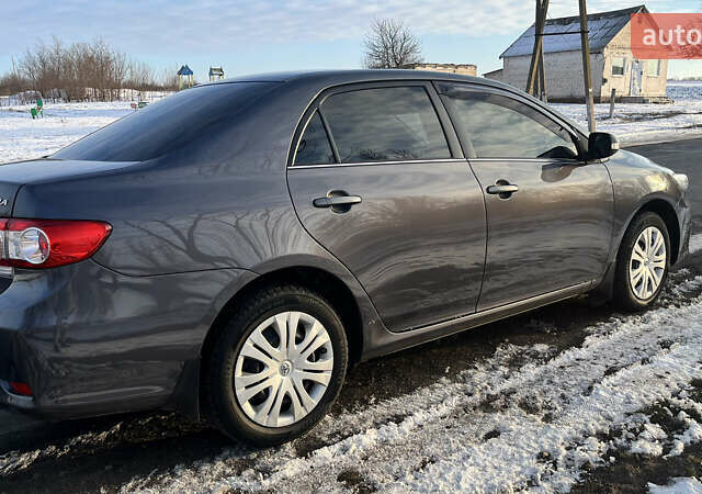 Сірий Тойота Королла, об'ємом двигуна 1.6 л та пробігом 240 тис. км за 9200 $, фото 13 на Automoto.ua